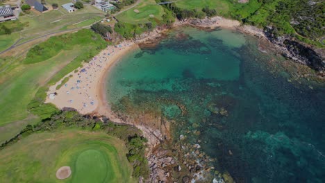 Little-Bay-Beach-With-And-The-Eastern-Suburbs-In-Sydney,-New-South-Wales,-Australia---Aerial-Drone-Shot