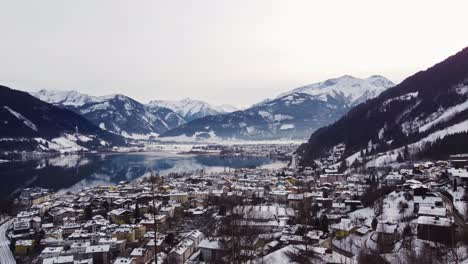 Establishing-shot-of-Zell-Am-See-townscape-in-winter,-covered-with-snow,-day