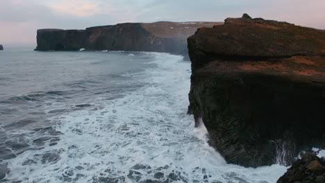 Rough-Waves-Crashes-On-Steep-Cliffs-At-Dyrholaey-Near-Vik-In-Iceland