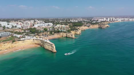 Cinematic-aerial-view-of-Armacao-de-Pera,-Algarve---Portugal