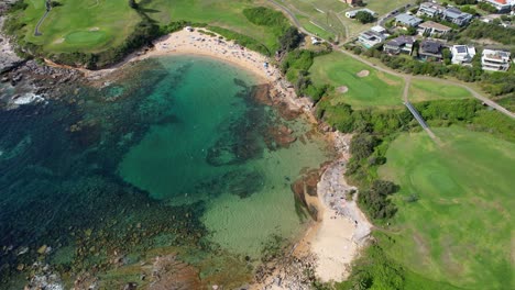 Aerial-View-Over-Little-Bay-Beach-In-Sydney,-New-South-Wales,-Australia---Drone-Shot