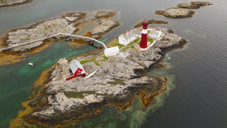 Aerial-establish-of-Tranoy-lighthouse-heritage-site-on-serene-calm-day
