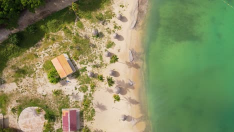 Aerial-top-down-static-view-of-bungalows-on-Santa-Cruz-beach