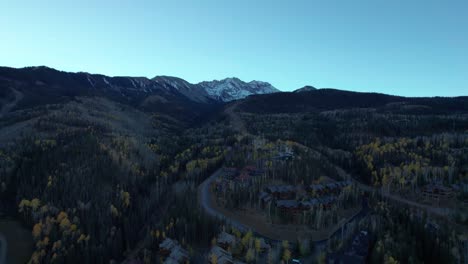 Drone-shot-scaling-up-the-mountainside-of-Telluride-Resort-ski-runs-in-the-fall