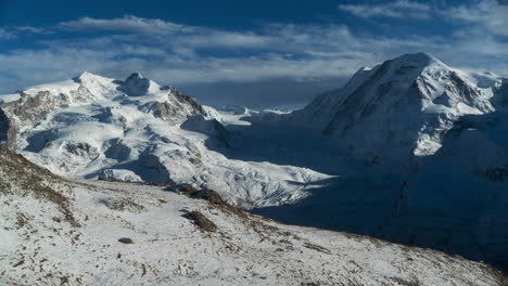 Zermatt-The-Matterhorn-glacier-paradise-landscape-view-Timelapse-The-Gornergrat-Switzerland-late-afternoon-rolling-clouds-Saas-Fee-Junfrangu-Swiss-Alps-mountains-still-motion