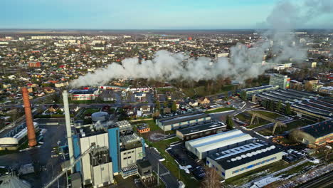 Smoke-Emission-From-Chimney-Of-Industrial-Refinery-In-Daytime