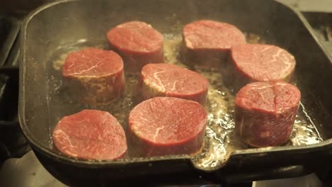 Cooking-Filet-Mignon-Steak-On-Grill-Pan