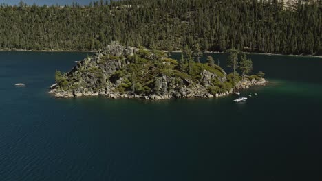 Aerial-footage-rotating-around-an-island-in-Lake-Tahoe