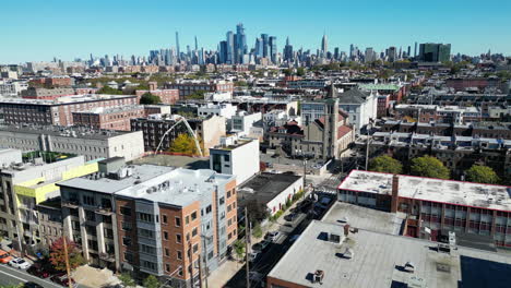 Experience-Hoboken's-charm-with-a-captivating-drone-pull-out-shot-revealing-the-breathtaking-New-York-City-view
