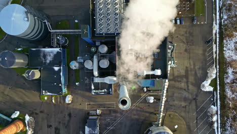 Smokestack-Emitting-Toxic-Gas-At-Industrial-Factory-On-Sunny-Day-In-Winter