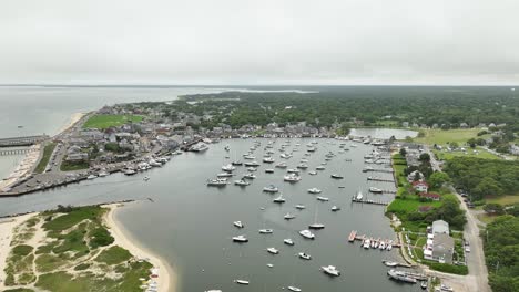 Drone-shot-pulling-away-from-the-expansive-marina-in-Oak-Bluffs,-Massachusetts