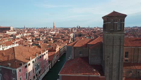 Venice-cityscape-with-santa-maria-assunta-church,-clear-sky,-aerial-view