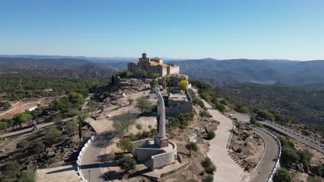 Our-Lady-of-Cabeza-pilgrim-destination-shrine-in-Andalusia-landscape-Spain-AERIAL-ORBITAL