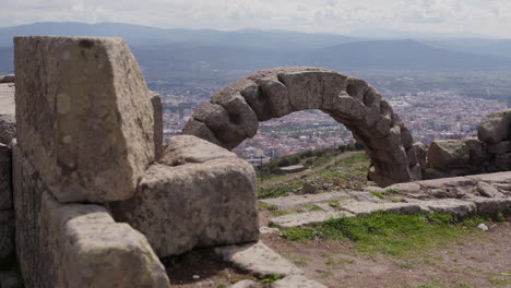 Stone-arch-overlooking-a-city-in-Pergamum