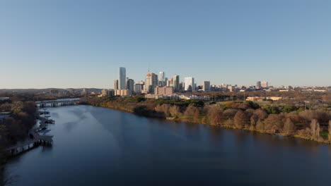 Drone-view-of-Austin-Texas-downtown-area-with-Lady-Bird-Lake-river