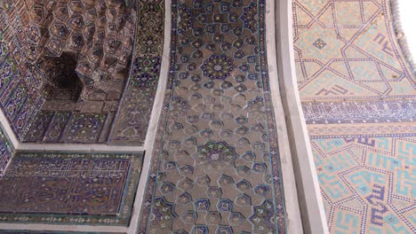 looking-up-at-detailed-ceiling-of-archway-door-to-islamic-mosque-in-Samarkand,-Uzbekistan-along-the-historic-Silk-Road