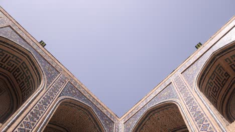 tiled-archways-in-historic-islamic-school-and-mosque-in-Samarkand,-Uzbekistan-along-the-historic-Silk-Road