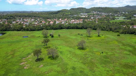 Aerial-over-Firth-Park,-Mudgeeraba-looking-towards-the-Hinterland,-Gold-Coast,-Queensland,-Australia