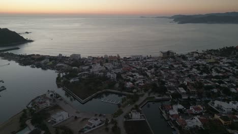 Aerial-of-Barra-de-Navidad-Jalisco-Mexican-Coastline-pacific-drone-sunset