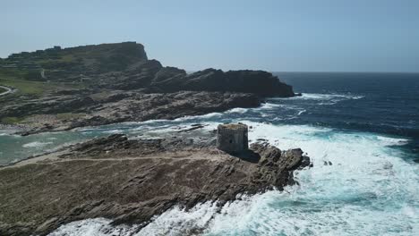La-Pelosa-old-sighting-tower-on-rocky-islet,-Sardinia
