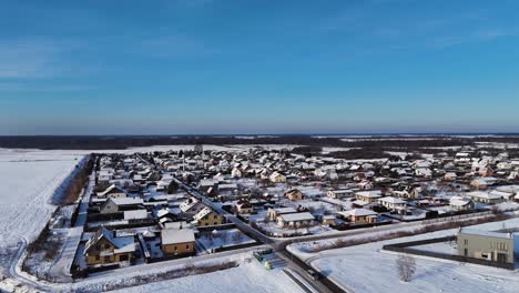 Cinematic-drone-shot-of-city-of-Silute-living-society-landscape-in-winter,-Lithuania