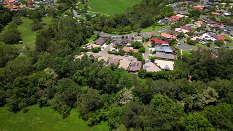 Aerial-over-Mudgeeraba-Creek-and-residential-housing,-Gold-Coast,-Queensland,-Australia