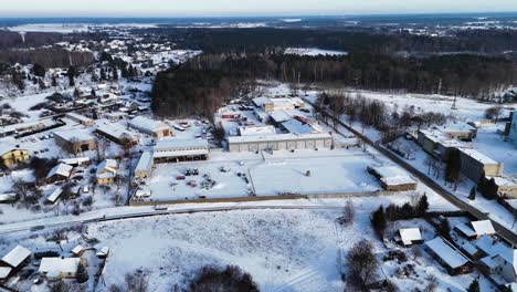 Drone-shot-of-city-of-Silute-in-winter,-Lithuania