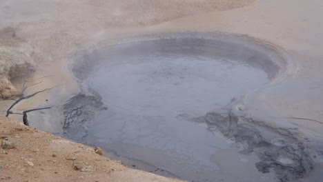 A-bubbling-Iceland-geothermal-mud-spring-with-plumes-of-steam-billowing-away
