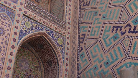 detailed-blue-tiling-and-islamic-artwork-on-mosque-in-Samarkand,-Uzbekistan-along-the-historic-Silk-Road