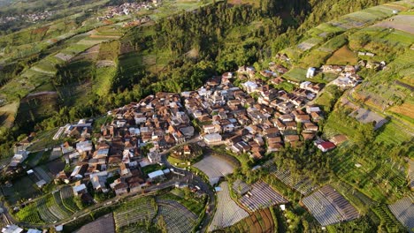 Aerial-view-of-countryside-on-the-slope-of-Sumbing-Mountain,-Indonesia