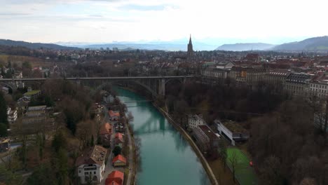 Arch-bridge-over-Aare-river-leading-to-historical-Bern-city-center
