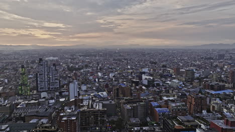 Bogota-Colombia-Aerial-v12-panoramic-views-drone-flyover-La-Salle-and-San-Luis-neighborhoods-capturing-beautiful-cityscape-with-sun-setting-on-the-city-skyline---Shot-with-Mavic-3-Cine---November-2022