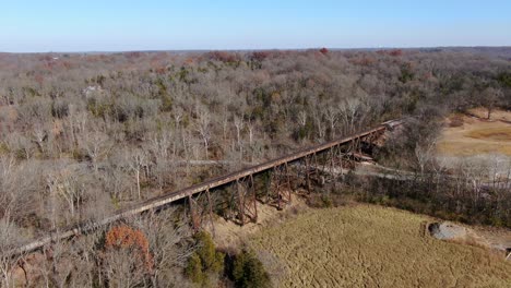 Aerial-Shot-Pushing-Forward-Towards-The-Pope-Lick-Railroad-Trestle-and-Across-the-Fields-and-Forest-in-Louisville-Kentucky