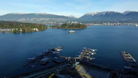 Panorama-Of-Seaplanes-Docked-At-Vancouver-Harbour-Flight-Centre-At-Coal-Harbour-In-Vancouver,-British-Columbia,-Canada