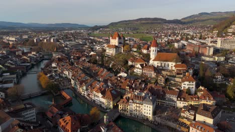 Historic-Thun-old-town-center-in-Switzerland-on-river-Aare-waterfront