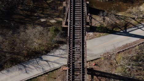 Top-Down-Aerial-Shot-Moving-Forward-Along-the-Pope-Lick-Railroad-Trestle-in-Louisville-Kentucky-During-the-Winter