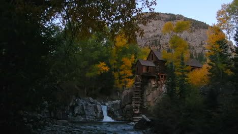 Colorado-Crystal-Mill-historic-landmark-waterfall-Crystal-River-Marble-sunset-autumn-fall-aerial-drone-cinematic-golden-hour-Carbondale-Telluride-Aspen-Pitkin-Gunnison-county-upward-slowly-motion