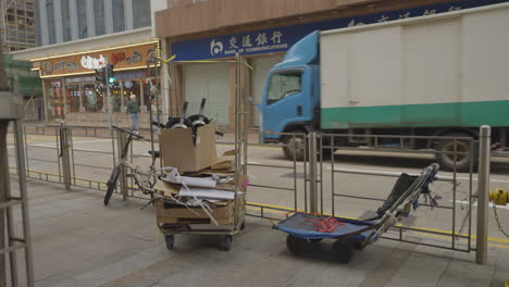 Ein-Trägerschieber-Zum-Schieben-Von-Waren-Auf-Einem-Bürgersteig-In-Hongkong,-China