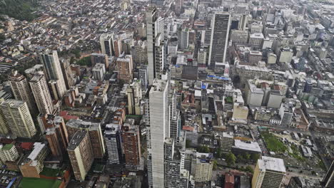 Bogota-Colombia-Aerial-v27-birds-eye-view-drone-flyover-Bosque-Izquierdo-capturing-BD-bacata-building,-downtown-cityscape-and-Monserrate-mountain-peak---Shot-with-Mavic-3-Cine---November-2022