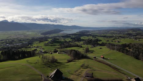 Aerial-remote-rural-village-houses-Switzerland-in-summer-green-landscape