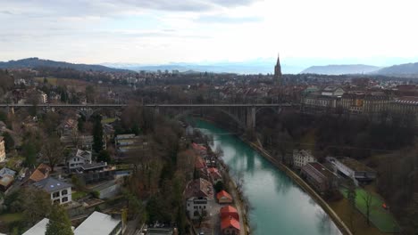 Arch-bridge-over-river-Aare-leading-to-historical-city-center-in-Bern