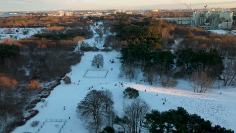 People-At-City-Park-During-Winter-In-Przymorze,-Gdansk,-Poland
