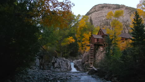 Colorado-Crystal-Mill-historic-landmark-waterfall-Crystal-River-Marble-sunset-autumn-fall-aerial-drone-cinematic-golden-hour-Carbondale-Telluride-Aspen-Pitkin-Gunnison-county-backwards-slowly-motion