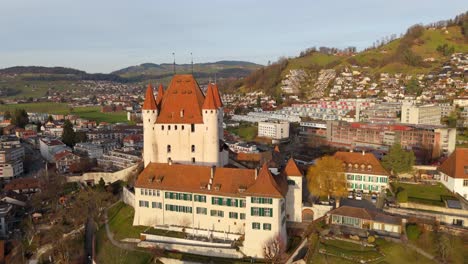 Medieval-Thun-castle-stronghold-towering-over-town-center,-Switzerland