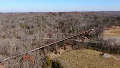 Aerial-Shot-Pushing-Forward-Towards-The-Pope-Lick-Railroad-Trestle-and-Across-the-Fields-and-Forest-in-Louisville-Kentucky