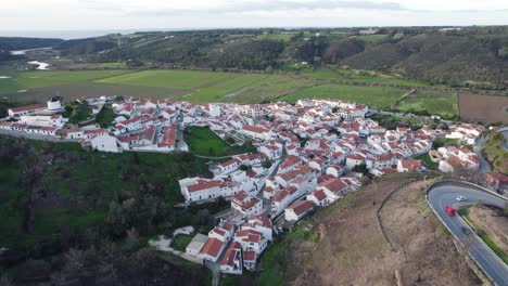 Tranquil-small-village-of-Odeceixe-in-Portugal-west-coast,-Aerial-establishing-shot