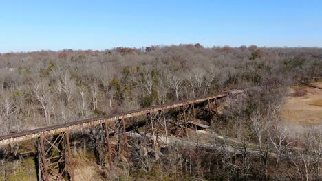 Aerial-Shot-Orbiting-the-Pope-Lick-Railroad-Trestle-in-Louisville-Kentucky-on-a-Bright,-Sunny-Afternoon