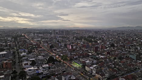 Bogota-Colombia-Aerial-v19-establishing-drone-flyover-Chapinero-capturing-busy-traffics-on-Avenida-Calle-63-and-dusk-cityscape-of-Quinta-Mutis-Barrios-Unidos---Shot-with-Mavic-3-Cine---November-2022