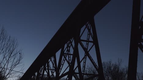 The-Pope-Lick-Railroad-Trestle-from-Below-in-Louisville-Kentucky,-Stretching-off-into-the-Distance-at-Twilight