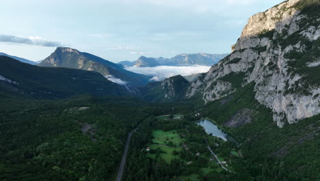 Majestic-Molveno-aerial-view-establishing-idyllic-northern-Italian-Trentino-region-valley-mountain-range